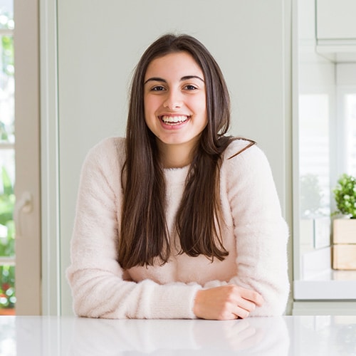Woman smiling at Smile Arc Orthodontics in San Diego, CA
